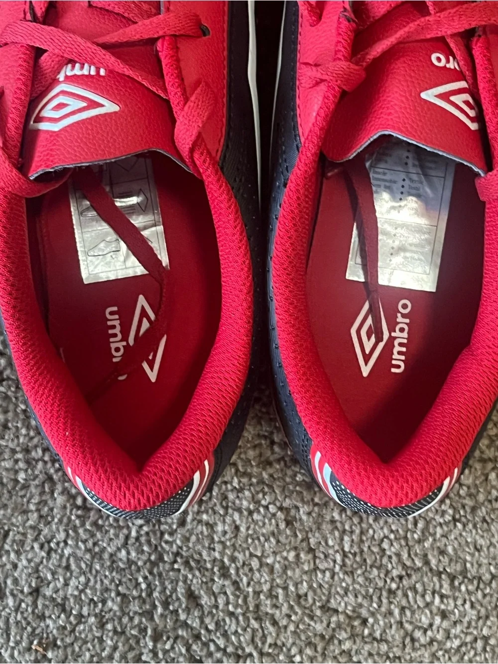 Umbro Red and Black Soccer Cleats with White Logo